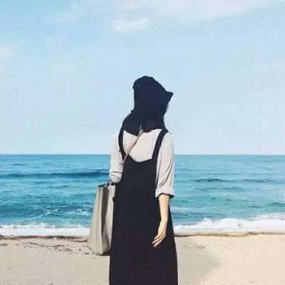 微信头像女背影海边 穿裙子盘头